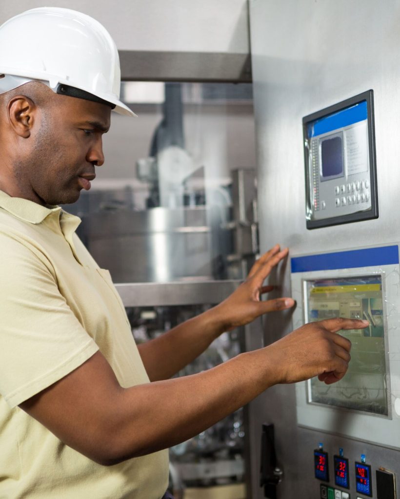 male-employee-operating-machine-manufacturing-industry